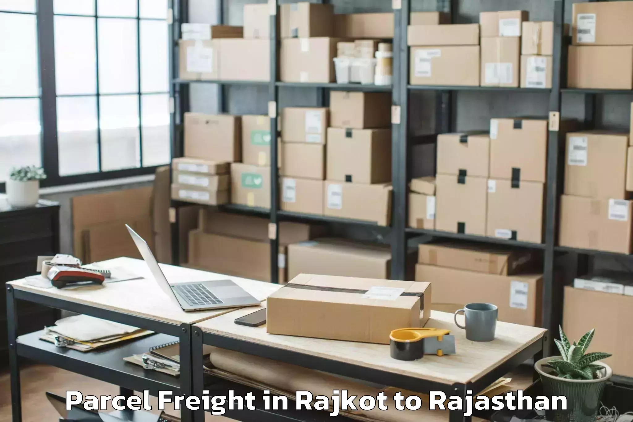 Trusted Rajkot to Central University Of Rajastha Parcel Freight